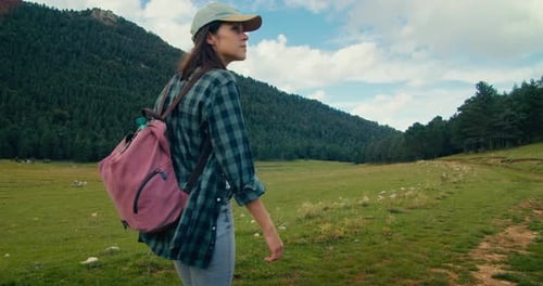 Trekking Young Woman with Backpack on Vacation Travel at Mountain Landscape