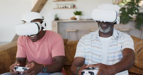 Men Enjoying Virtual Reality Gaming Together at Home