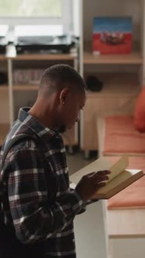Young Adult Reading Book Indoors