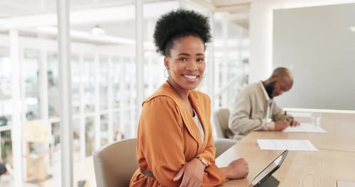 Happy, smile and face of a professional black woman in the office conference room for a meeting
