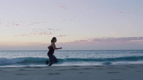 Woman, fitness or running on sunset beach workout, training or exercise in healthcare wellness