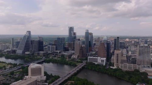 Downtown Austin Skyline with the Colorado River and Modern Skyscrapers Surrounded By Greenery in