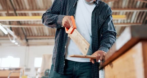 Saw, wood and carpenter in workshop with tools and construction process in garage closeup