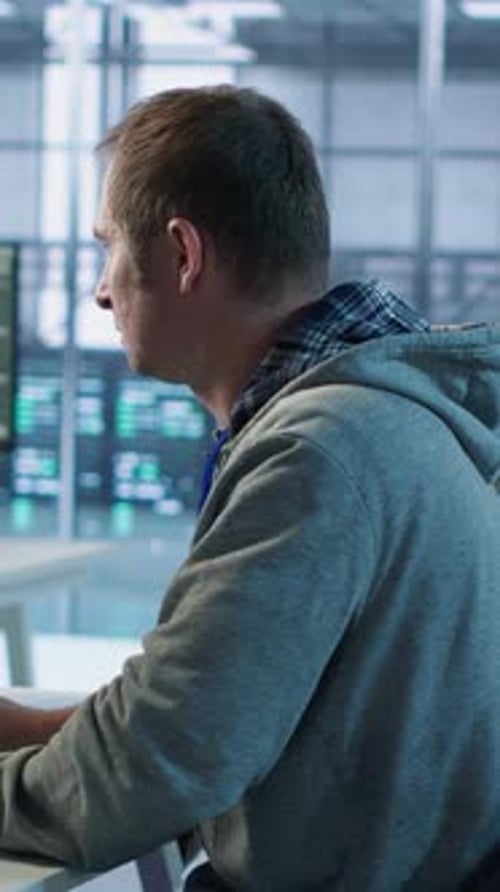 Man Requesting Help From Coworkers After Finding Bug in Data Center Systems