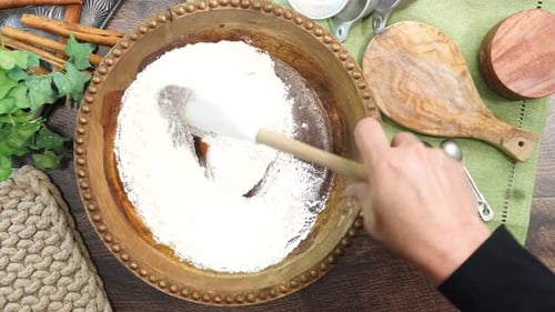 Mixing Baking Ingredients in Bowl with Spatula
