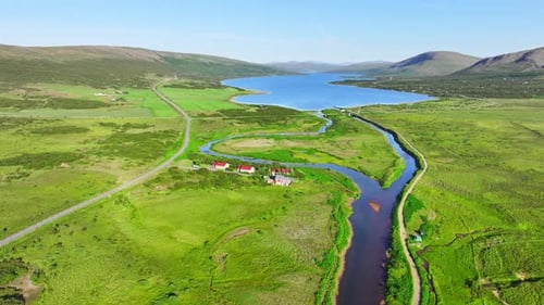 Stunning Countryside in Iceland Farmhouses in a Northern Country Hilly Landscape on a Sunny Day