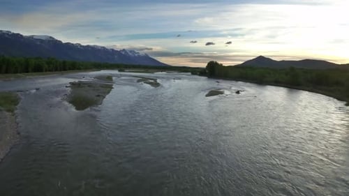 Drone View Of Sunset Sky With Snowcapped Mountains And River 7