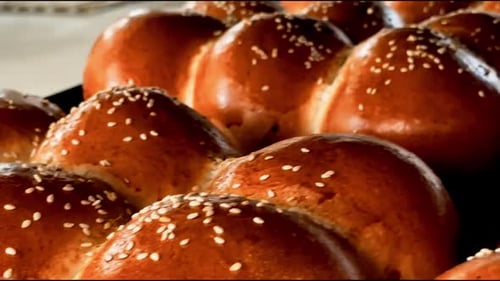 Golden Brown Rolls with Sesame Seeds Fresh from Oven