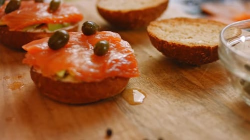 Delicious Bagels with Salmon and Avocado Close Up