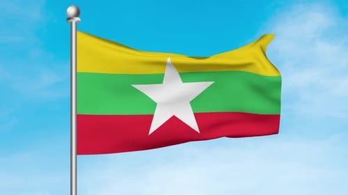 Myanmar-Flagge weht im blauen Himmel, Vorderansicht