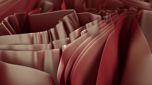 Smooth Elegant Satin Ribbons in Shades of Red and Beige Intertwine Forming a Visually Captivating