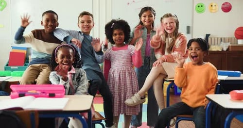 Face, children and group in classroom, waving or excited for education in school, smile or learning