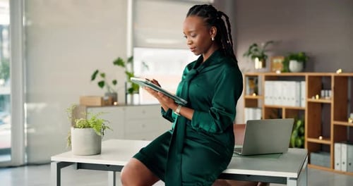 Tablet, online and business black woman in office for research, website and financial review