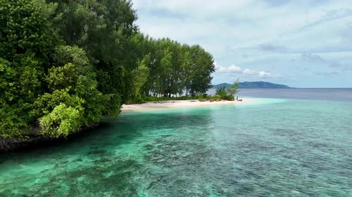 Aerial view of island with white sand, Indonesia.