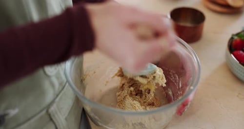 Mixing Food Ingredients in Bowl at Home