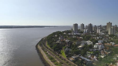 A drone shot of the beautiful coastal city of Posadas, Argentina. The city is located on the banks o