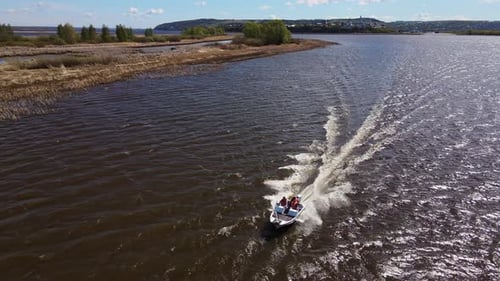 Aerial A Boat Floating on a River