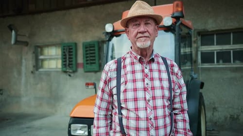 Portrait of Senior Caucasian Handsome Happy Man Farmer Standing in Field and Smiling to Camera Big