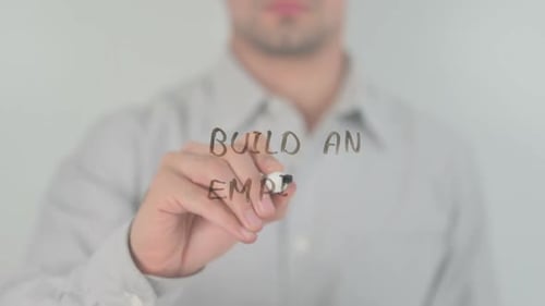 Man Writes 'Build an Empire' on Glass