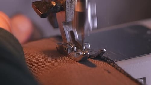 Sewing Machine Stitching Brown Cloth Close Up