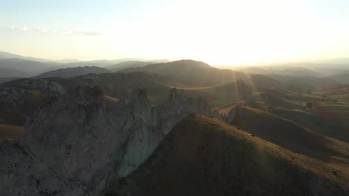 Aerial View Of Cliffs And Mountains At Sunset