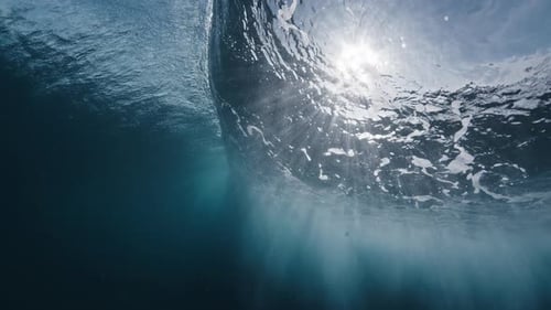 Crystal Clear Wave Breaks in the Ocean on the Maldivian Shore