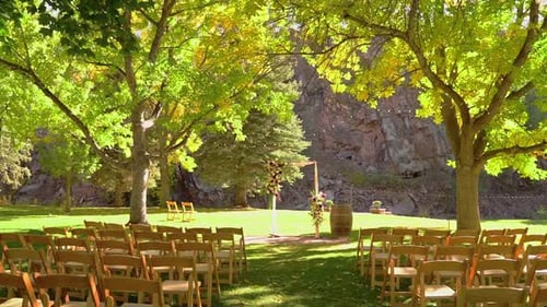 Beautiful Outdoor Autumn Fall Wedding Venue Aisle In Lush Green Yellow Setting.