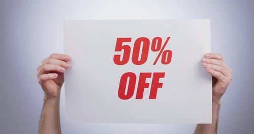 Hands, discount percentage and advertising sign at studio isolated on a white background