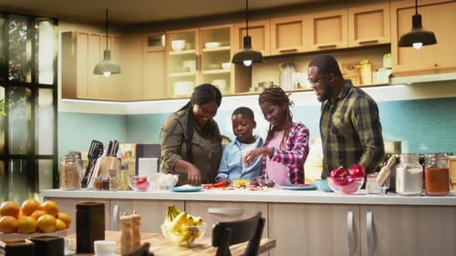 Happy Family Cooking Together in Modern Kitchen