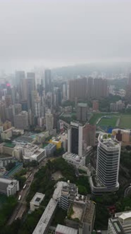 VUE AÉRIENNE : Happy Valley et le district de Wan Chai à Hong Kong, prise de vue par Drone d'Urban Arch
