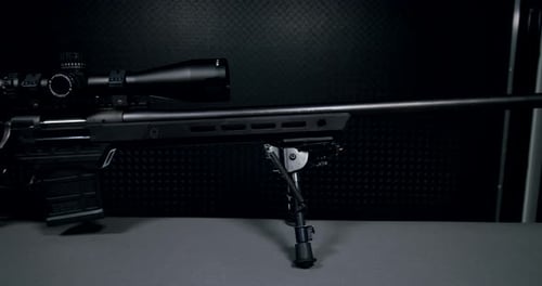 Rifle with Scope on Bipod Panning Shot