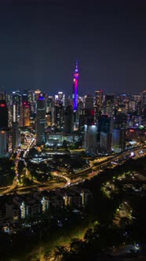 Aerial Timelapse of Traffic and Kuala Lumpur City Skyline at Night Malaysia