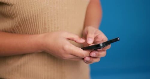 Close Up Woman Holding Mobile Phone Using Mobile App Text Message Selective Focus on Hands