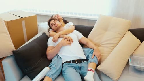 Young Couple Move Into New Apartment