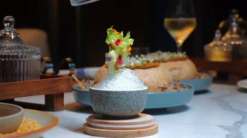 Gourmet Dining Setup Featuring Assortment of Elegant Dishes