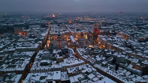 Flying in winter towards Main Square (Rynek Glowny) in Krakow (Cracow), Poland