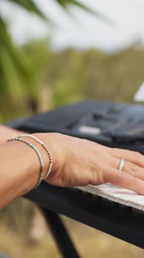 Hands Of Boy Pianist Musical Composer During A Private Pool Party