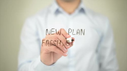 New Plan Fresh Start Man Writing on Transparent Screen