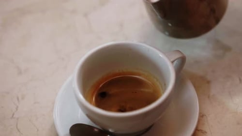 Foam Milk Poured Into Coffee Cup