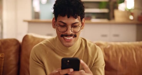 Young Adult on Phone at Home