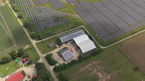 Industrial scale solar panels over fields, clean energy, Netherlands