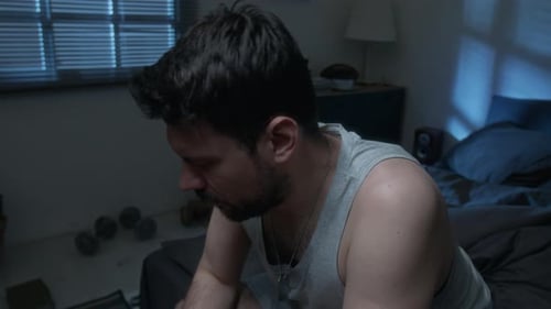 Man Drinking Alcohol at Night Alone