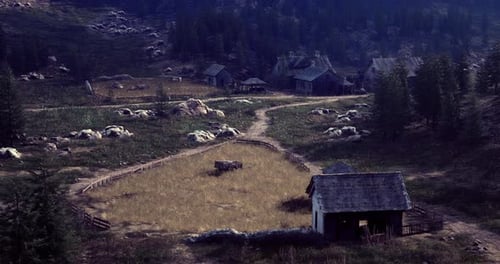 Paisaje rural con granjas y campos al anochecer en un valle aislado