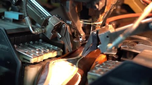 a craftsman handmade a shoe by a close up shot, insert shot