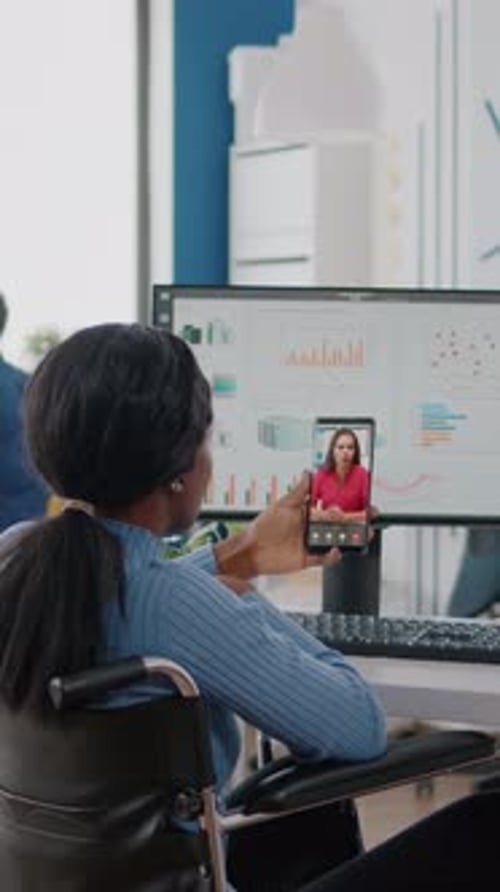 Businesswoman in Wheelchair on Video Conference