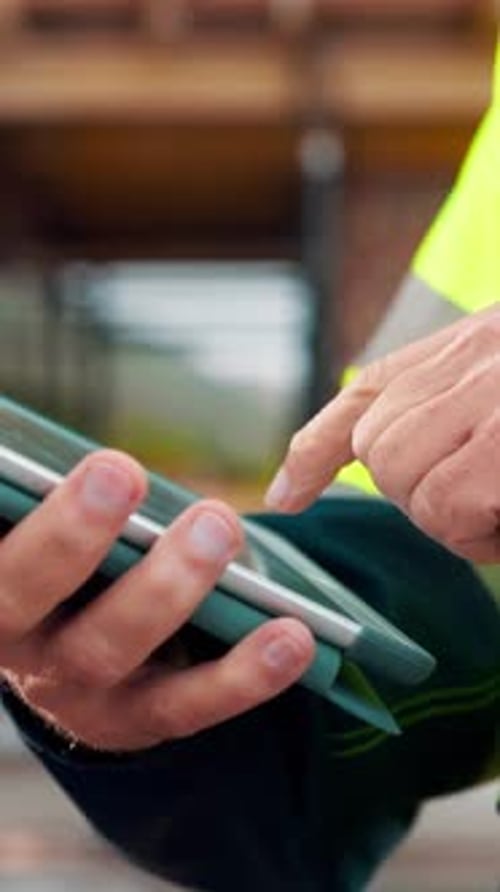 Contractor, construction site and hands with tablet, typing or urban planning for quality control