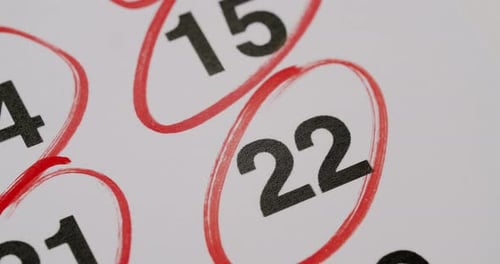 CloseUp of Calendar Dates Marked with Red Circle Highlighting Important Days