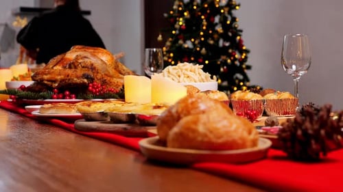 Christmas dinner with roasted turkey, food on table in dinning room for Christmas dinner celebration