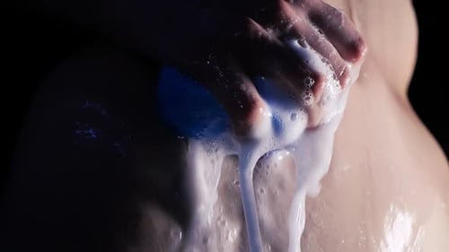 Hand Washing Body with Blue Sponge and Soap