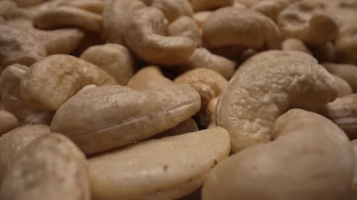 Macro of Raw Cashew Nuts Detailed CloseUp with Natural Textures Nutty Kernels